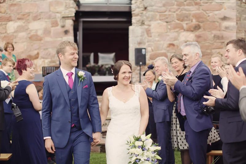Happy bride and groom at Blencowe Hall, The Rowley Estates, Lake District wedding