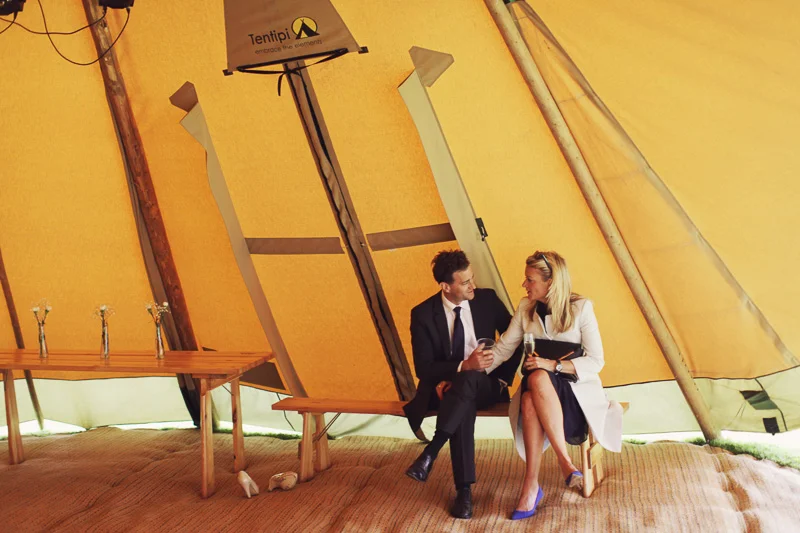 Sitting in the tipi at Blencowe Hall, The Rowley Estates, Lake District wedding
