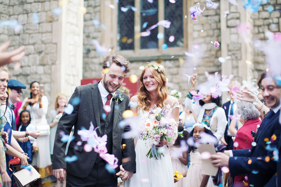 Beautiful natural wedding photography at St. Michael's Chester Square church wedding venue in Westminster London confetti throw