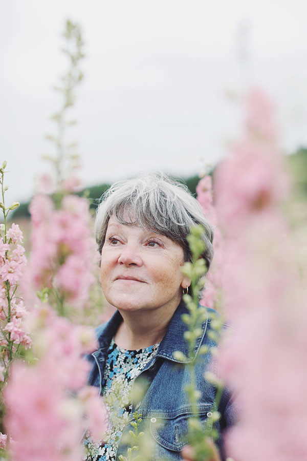 Confetti fields photoshoot Pershore | Portrait photographer Real Flower confetti field photography | Mature lady photoshoot