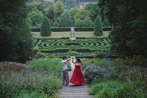 Chatsworth House Surprise wedding proposal photography with scenic gardens in the background.