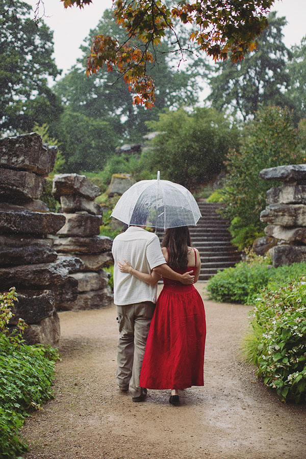 Romantic proposal in the lush gardens of Chatsworth House, perfect for engagement photography.