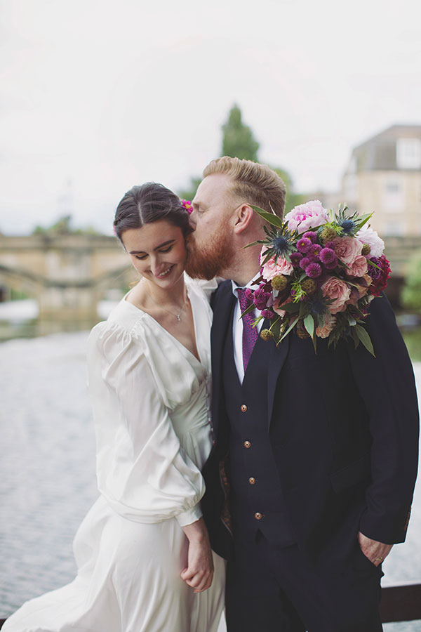 Couple enjoying relaxed wedding portraits in Stamford’s picturesque surroundings