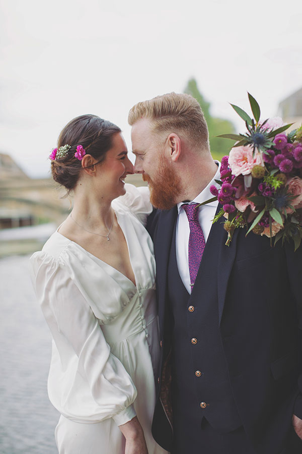 Couple enjoying relaxed wedding portraits in Stamford’s picturesque surroundings