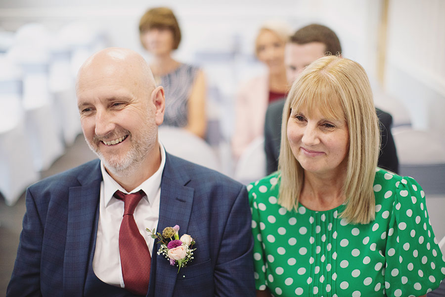 Bride and groom exchanging vows during an intimate elopement at Stamford Registry Office