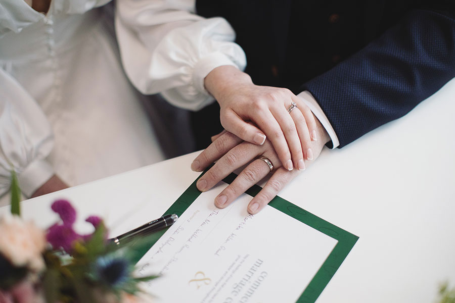 Bride and groom exchanging vows during an intimate elopement at Stamford Registry Office