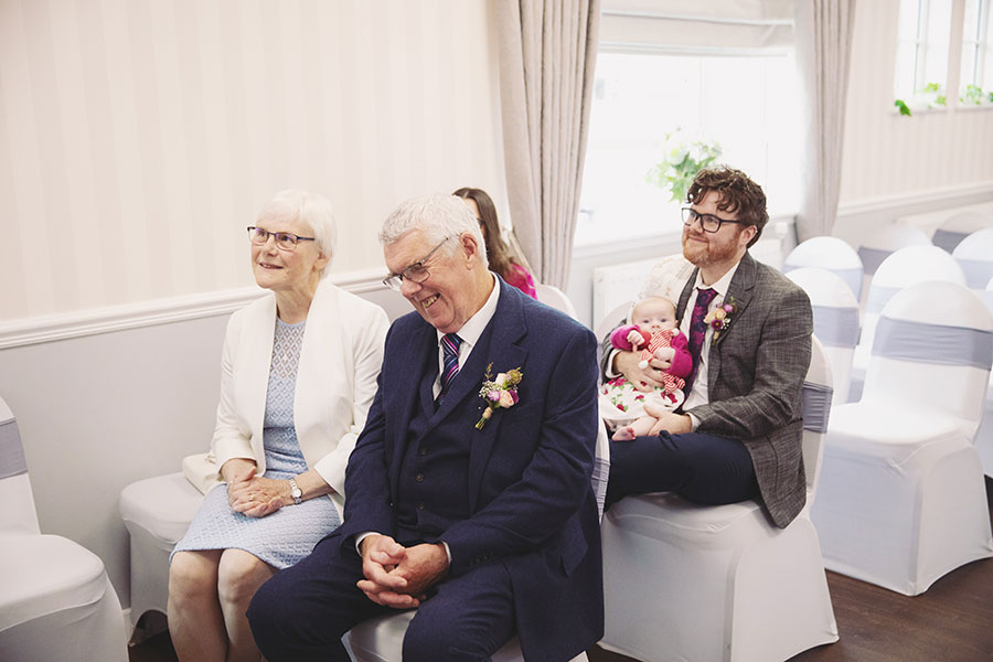 Candid wedding photography at Stamford Registry Office capturing a romantic elopement