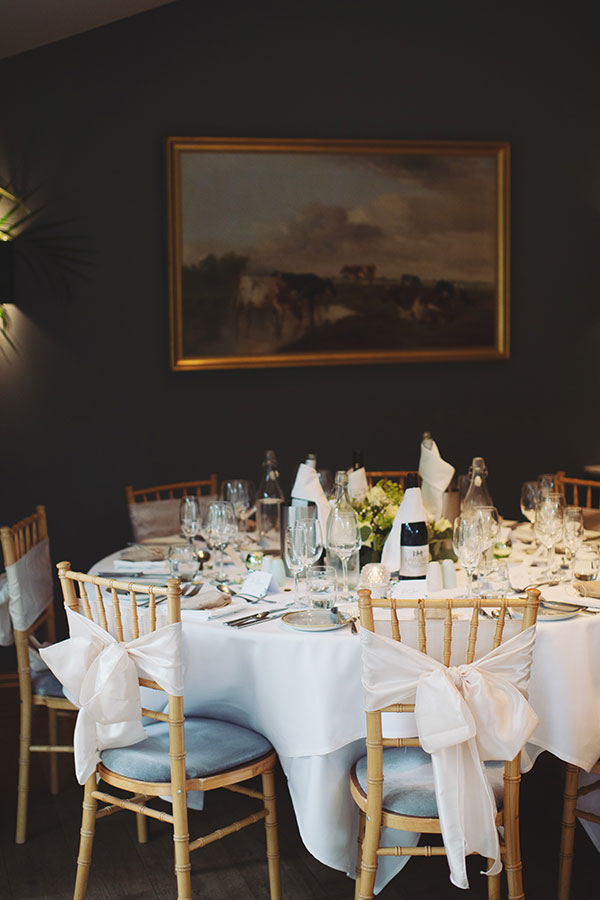 Indoor reception setup with rustic décor at a Biggin Hall Hotel wedding.
