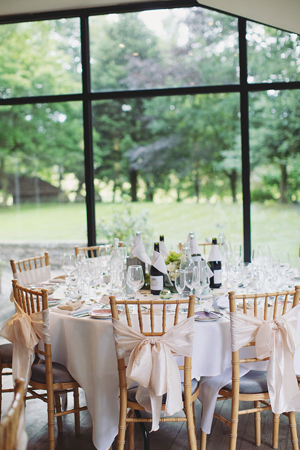 Indoor reception setup with rustic décor at a Biggin Hall Hotel wedding.
