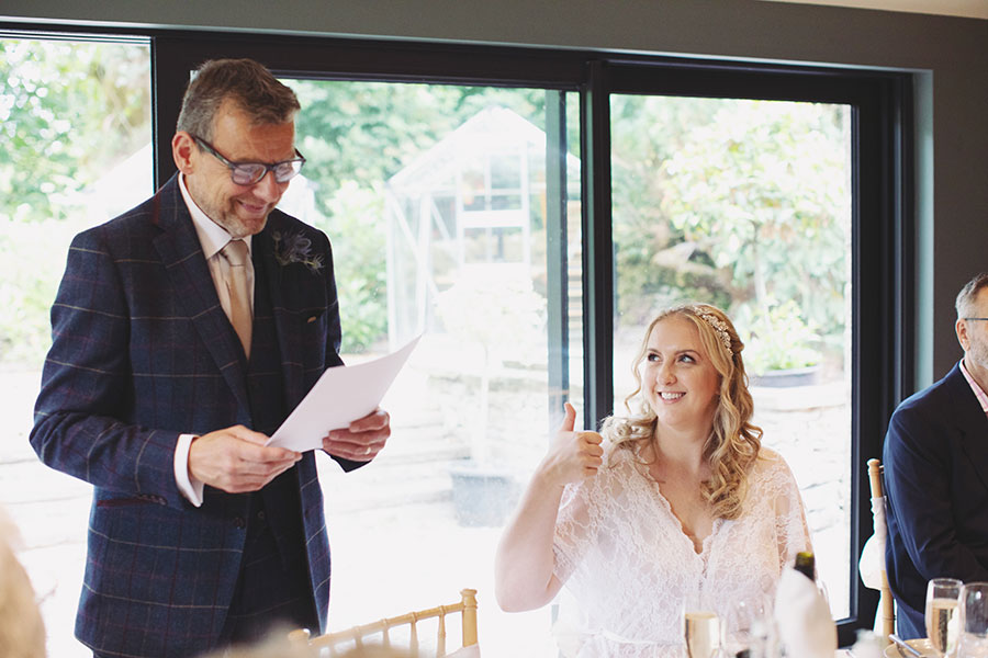 Indoor reception setup with rustic décor at a Biggin Hall Hotel wedding.