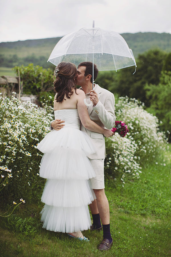 Bride and groom walking through the grounds during their Cliff College wedding photography session in Hope Valley.