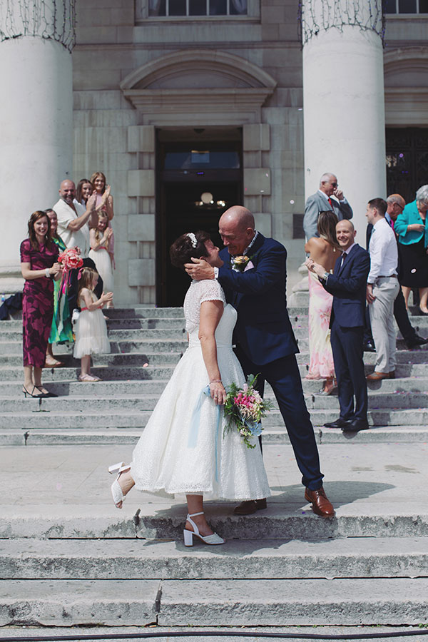 Lisa & Dean ♡ Leeds Civic Hall Wedding 20 Bride and groom on the grand entrance steps at Leeds Civic Hall wedding