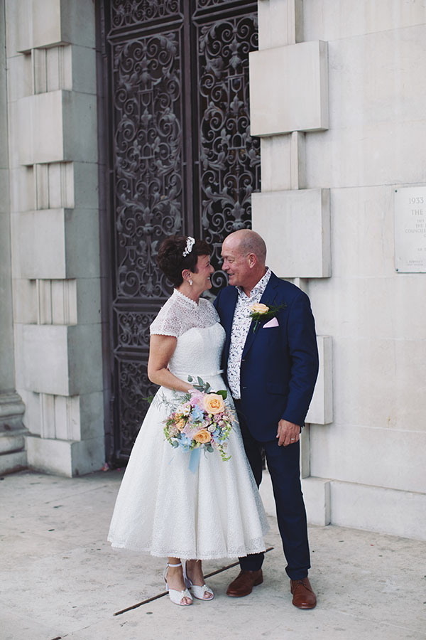 Lisa & Dean ♡ Leeds Civic Hall Wedding 23 Bride and groom on the grand entrance steps at Leeds Civic Hall wedding