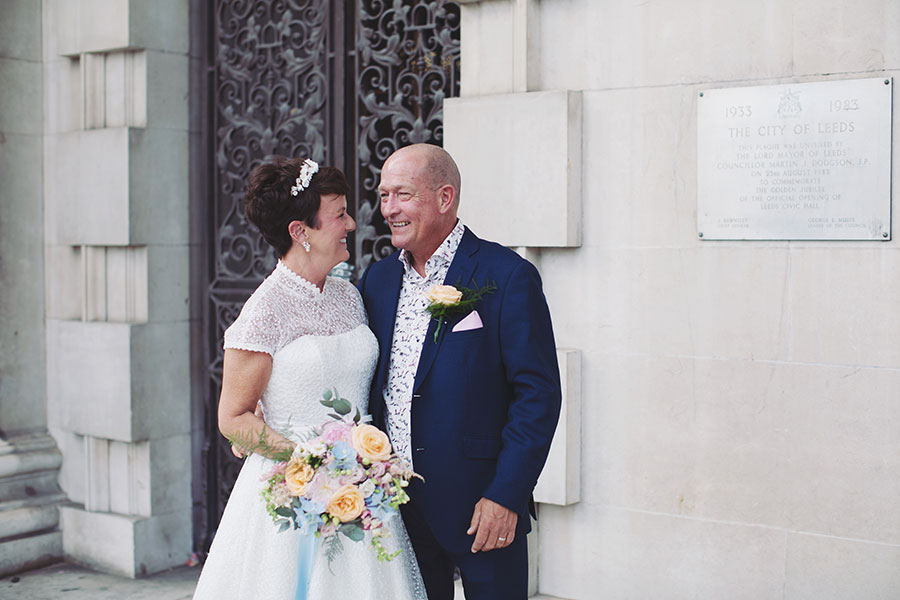 Lisa & Dean ♡ Leeds Civic Hall Wedding 25 Bride and groom on the grand entrance steps at Leeds Civic Hall wedding