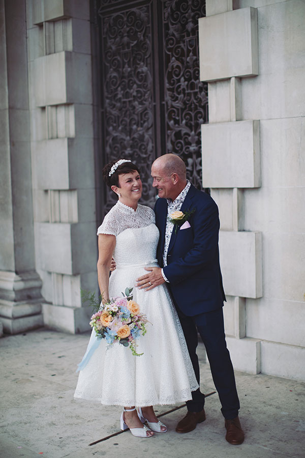 Lisa & Dean ♡ Leeds Civic Hall Wedding 28 Bride and groom on the grand entrance steps at Leeds Civic Hall wedding