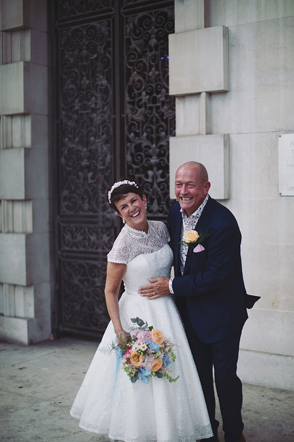 Lisa & Dean ♡ Leeds Civic Hall Wedding 30 Bride and groom on the grand entrance steps at Leeds Civic Hall wedding
