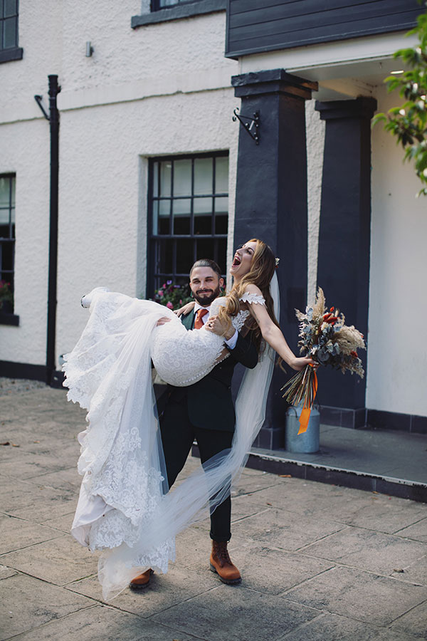 Relaxed couple photos outside The Croft Hotel wedding venue in Darlington