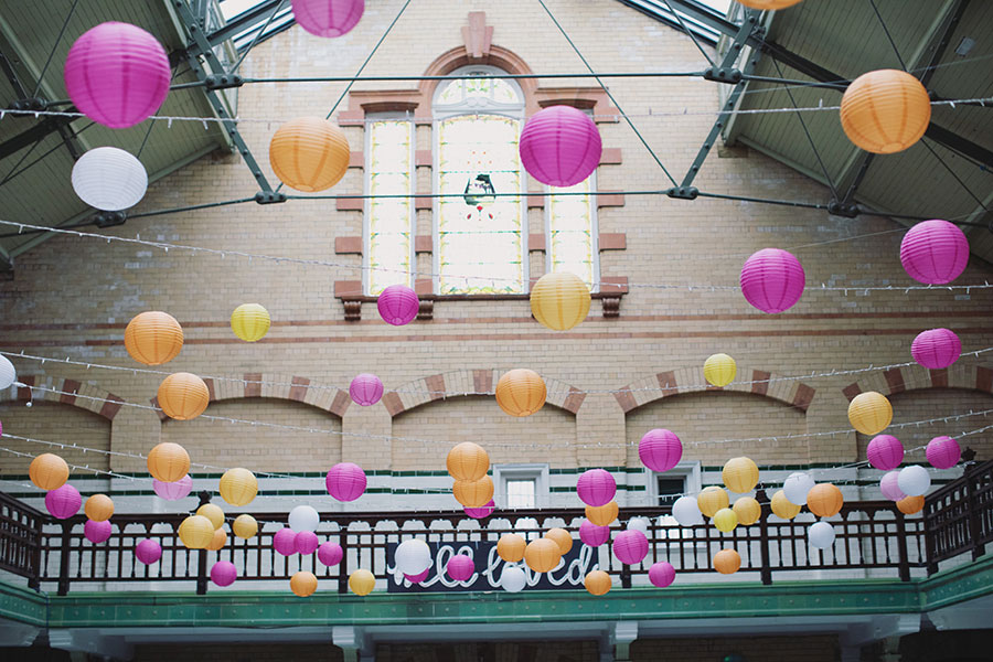 Alex & Aishling ♡ Manchester Victoria Baths Wedding 18 Wide shot of Manchester Victoria Baths wedding with guests and historic surroundings