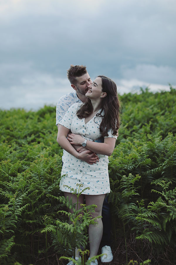 Diana & Alex ♡ Peak District Engagement Photoshoot 5 Engaged couple Diana and Alex looking at each other during their Peak District engagement photoshoot.