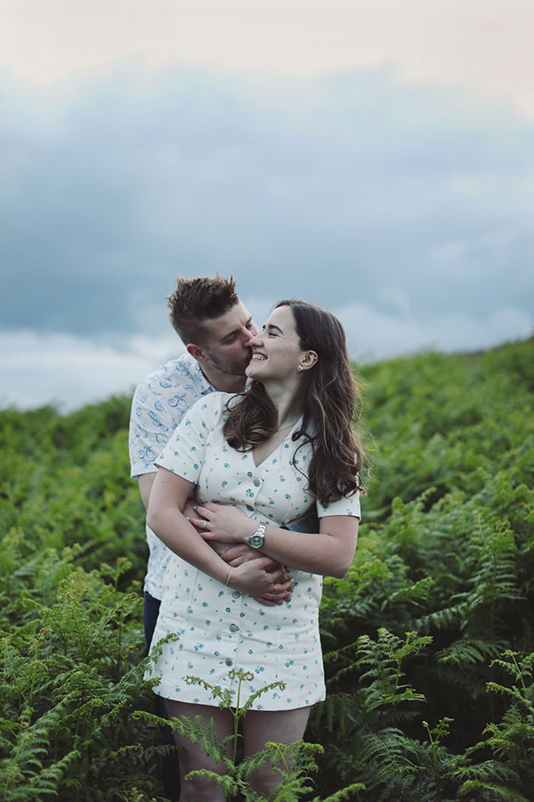 Diana & Alex ♡ Peak District Engagement Photoshoot 8 Engaged couple Diana and Alex looking at each other during their Peak District engagement photoshoot.