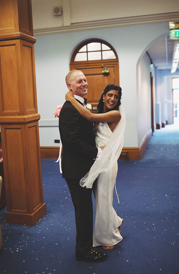 Rich and Shaily exchanging vows during their Sheffield Town Hall wedding ceremony