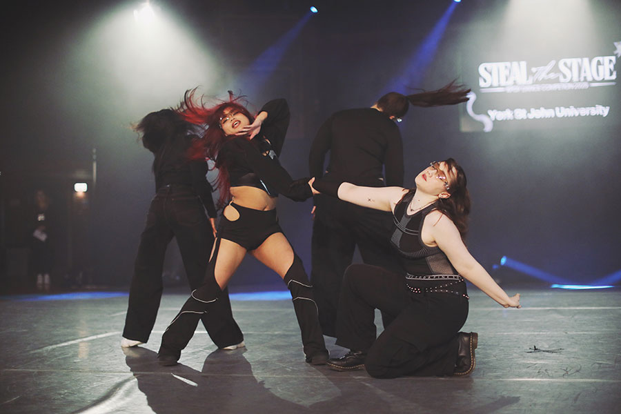 UK Kpop Dance Competition ♡ Steal The Stage 2025 32 Girl group dance team hitting a synchronised formation during competition at the University of Sheffield.