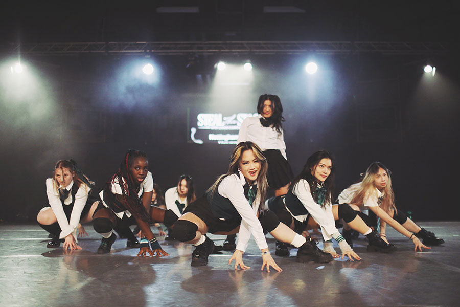 UK Kpop Dance Competition ♡ Steal The Stage 2025 37 Girl group dance team hitting a synchronised formation during competition at the University of Sheffield.