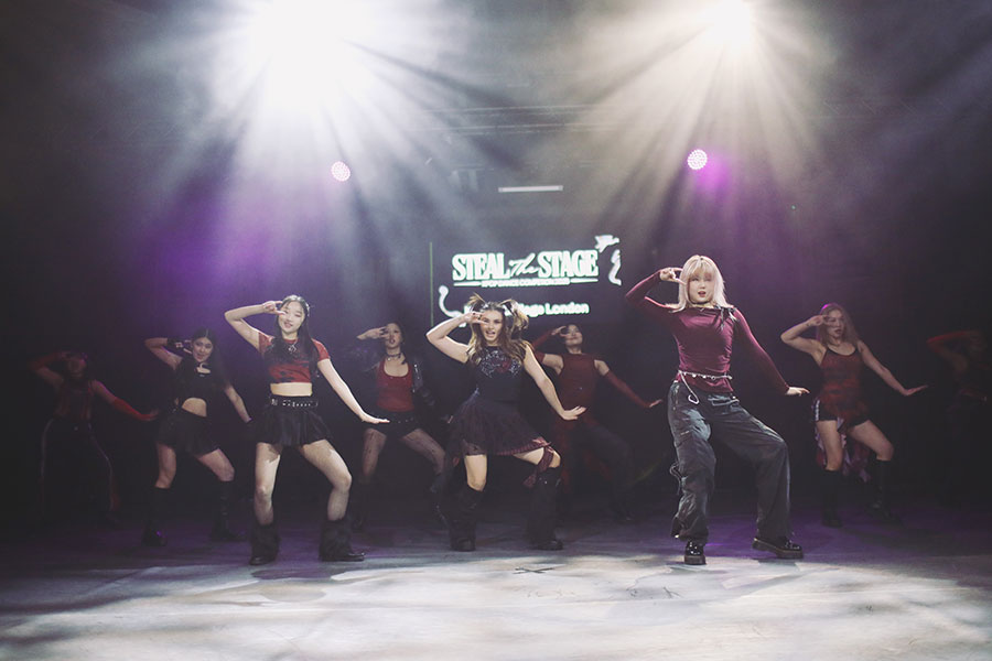 UK Kpop Dance Competition ♡ Steal The Stage 2025 39 Girl group dance team hitting a synchronised formation during competition at the University of Sheffield.