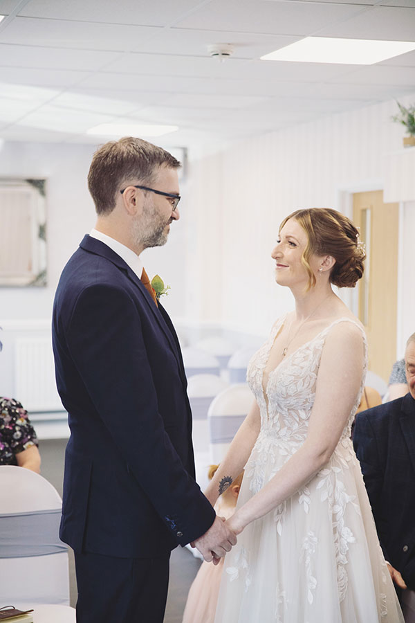 Documentary-style Stamford Registry Office wedding photography of happy couple