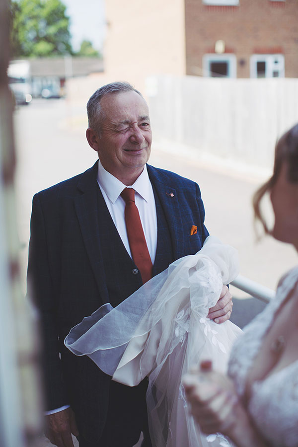 Documentary-style Stamford Registry Office wedding photography of happy couple