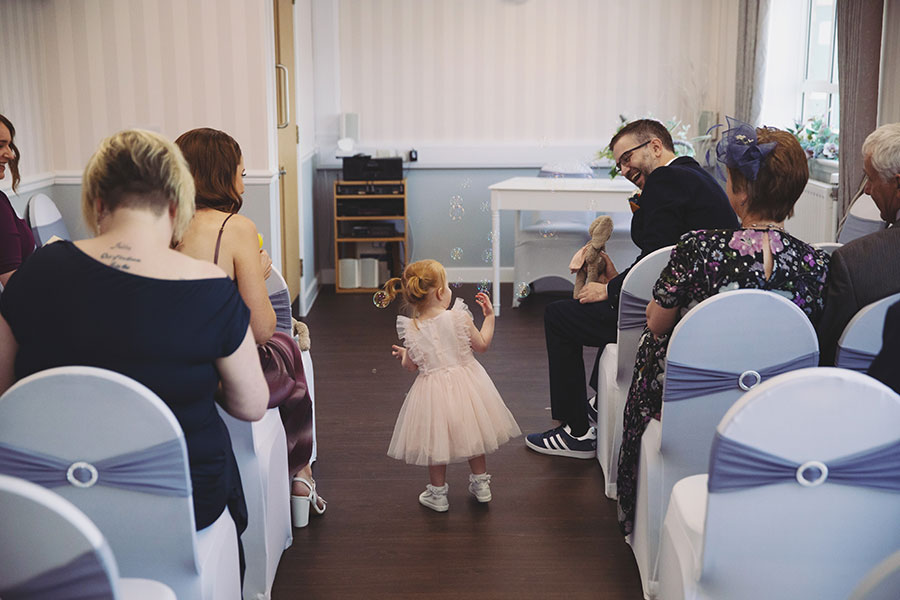 Documentary-style Stamford Registry Office wedding photography of happy couple