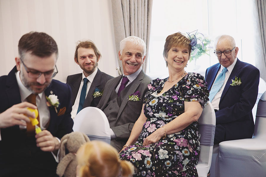 Documentary-style Stamford Registry Office wedding photography of happy couple