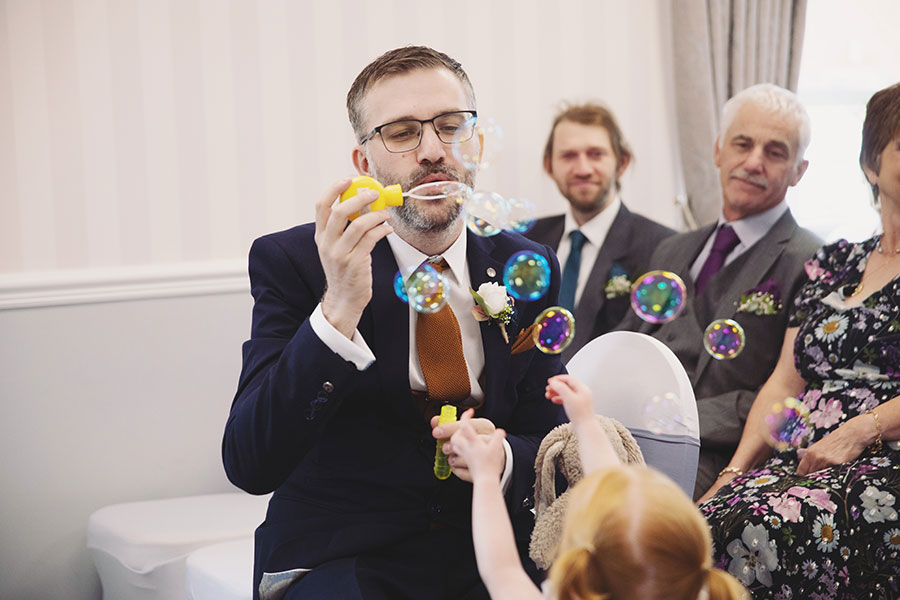 Documentary-style Stamford Registry Office wedding photography of happy couple