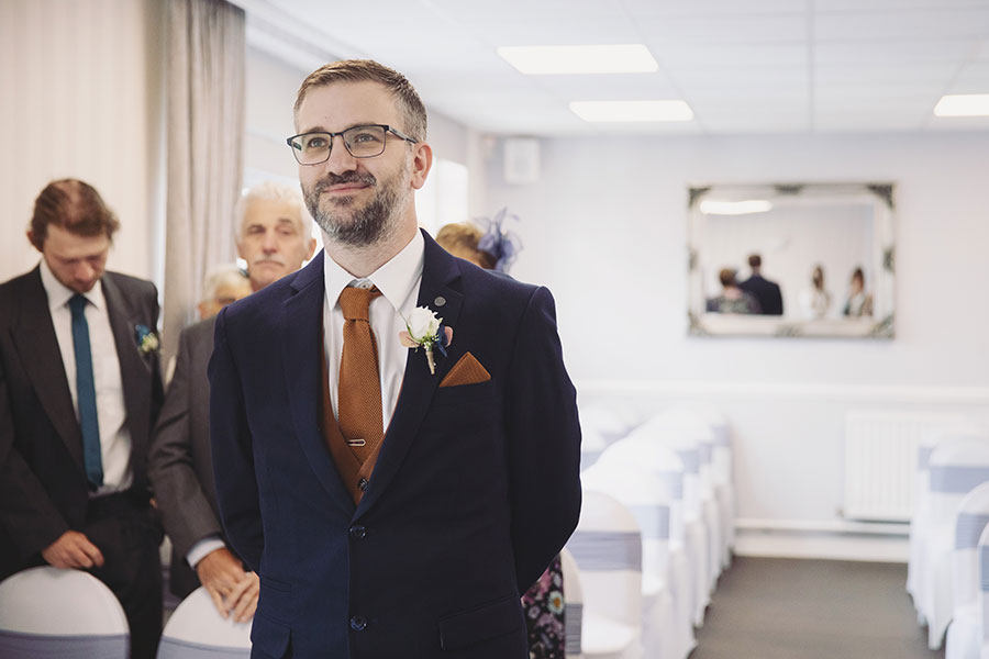 Documentary-style Stamford Registry Office wedding photography of happy couple