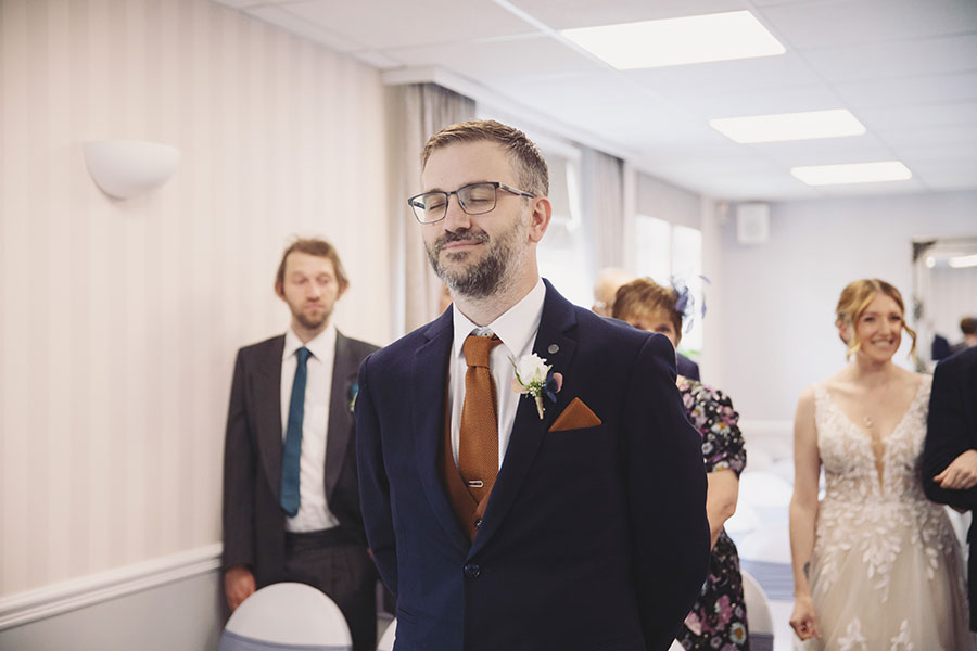 Documentary-style Stamford Registry Office wedding photography of happy couple