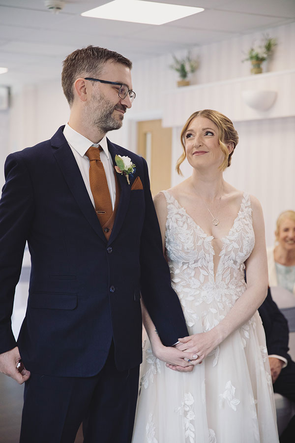 Documentary-style Stamford Registry Office wedding photography of happy couple