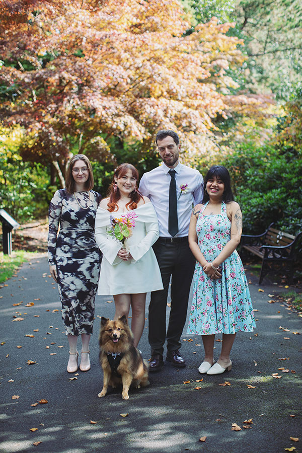 Manchester wedding photography capturing Rebecca and Tom celebrating with friends after their ceremony