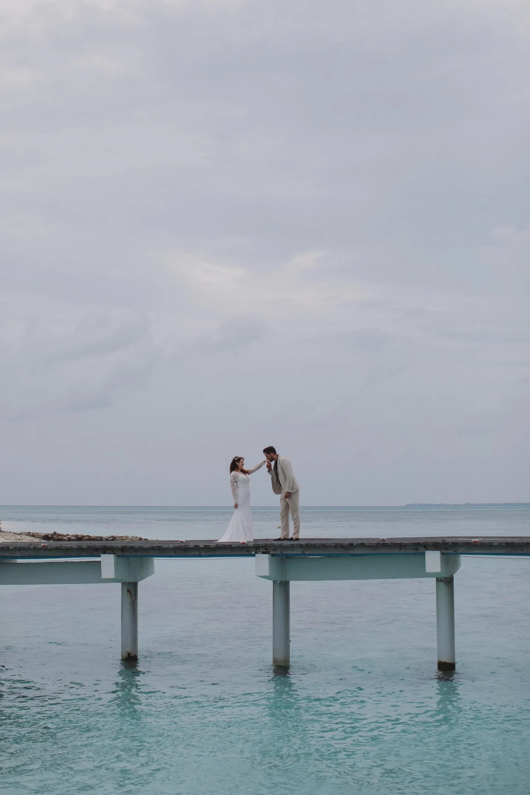 Maldives Wedding for Two Beneath Cloudy Skies
