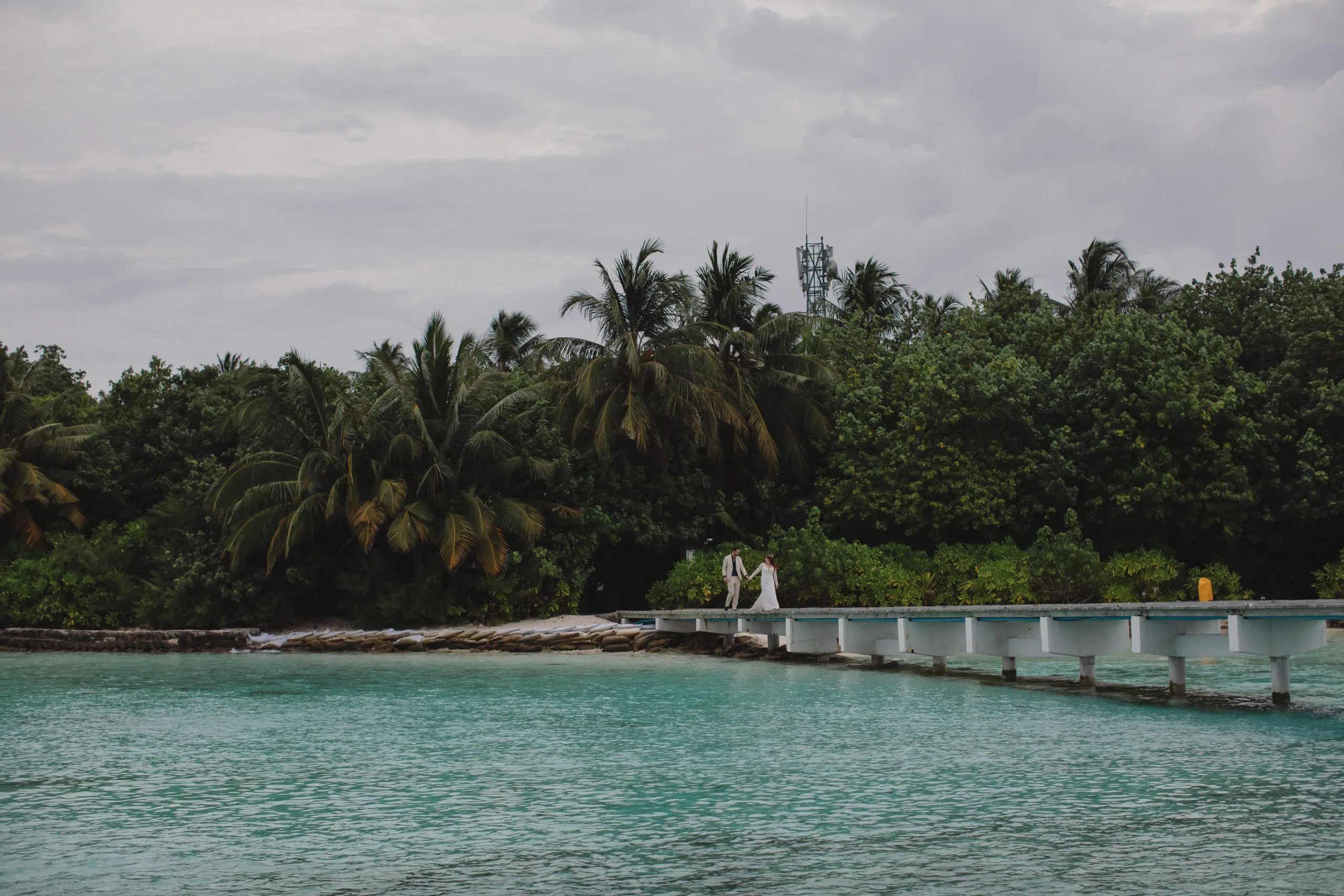 Maldives Wedding for Two Beneath Cloudy Skies