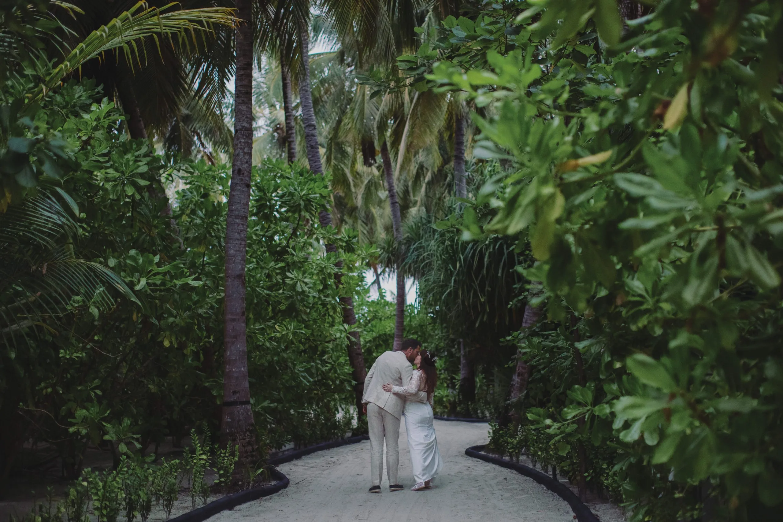 Maldives Wedding for Two Beneath Cloudy Skies