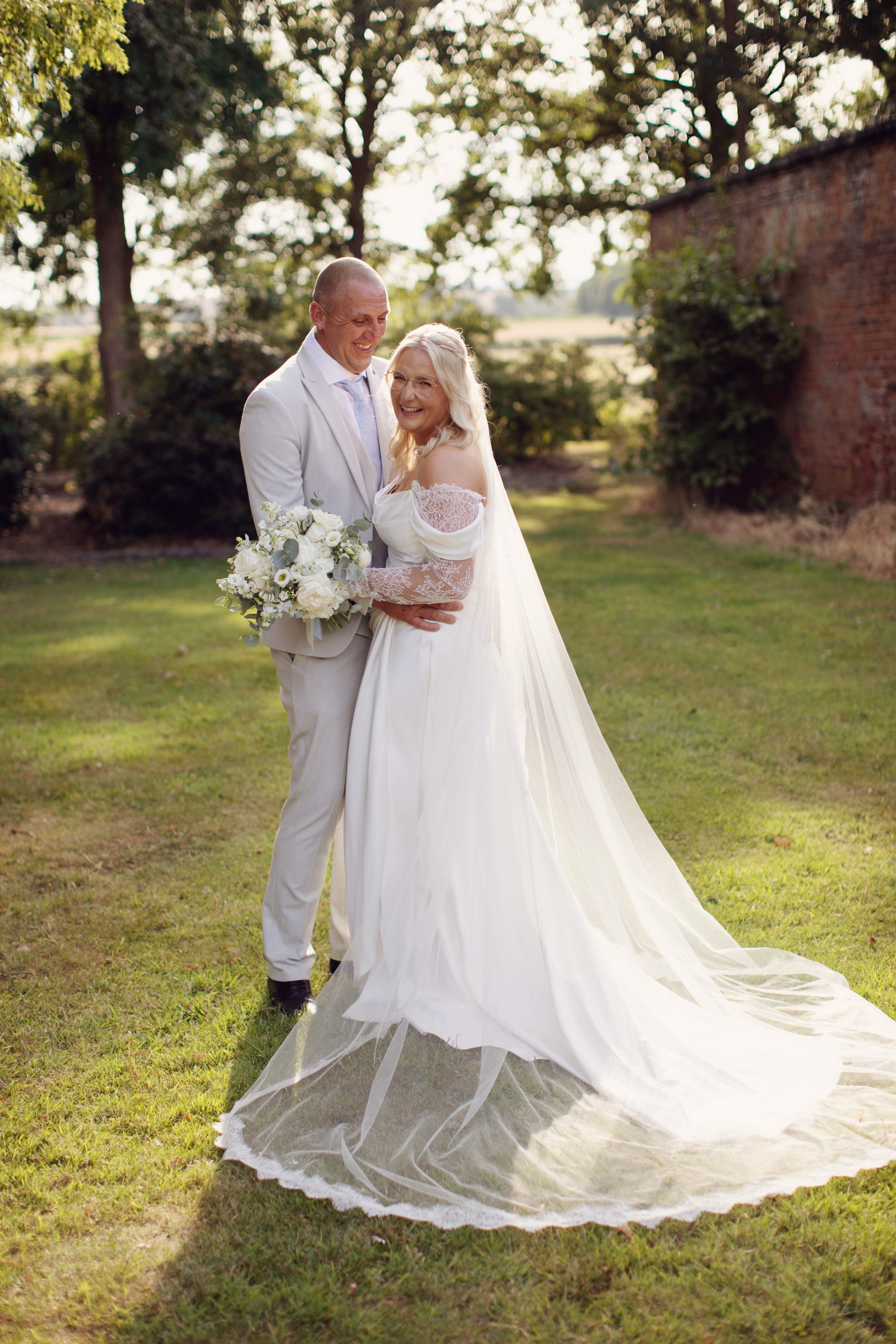 Marisa & Steven ♡ Thorpe Garden Wedding Photography 56 Bride and groom embracing in the gardens at Thorpe Garden