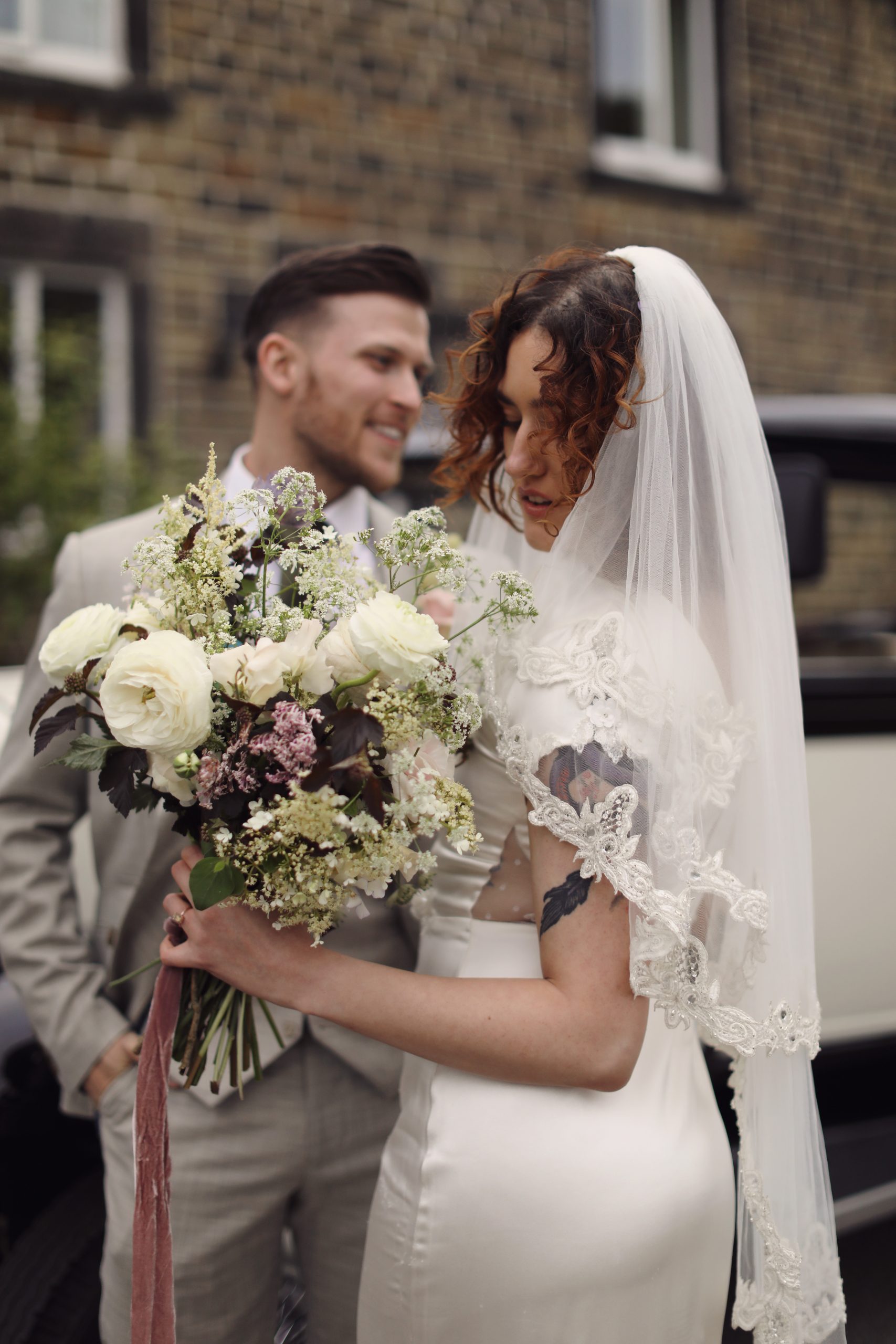Editorial wedding portraits with a classic vintage car.