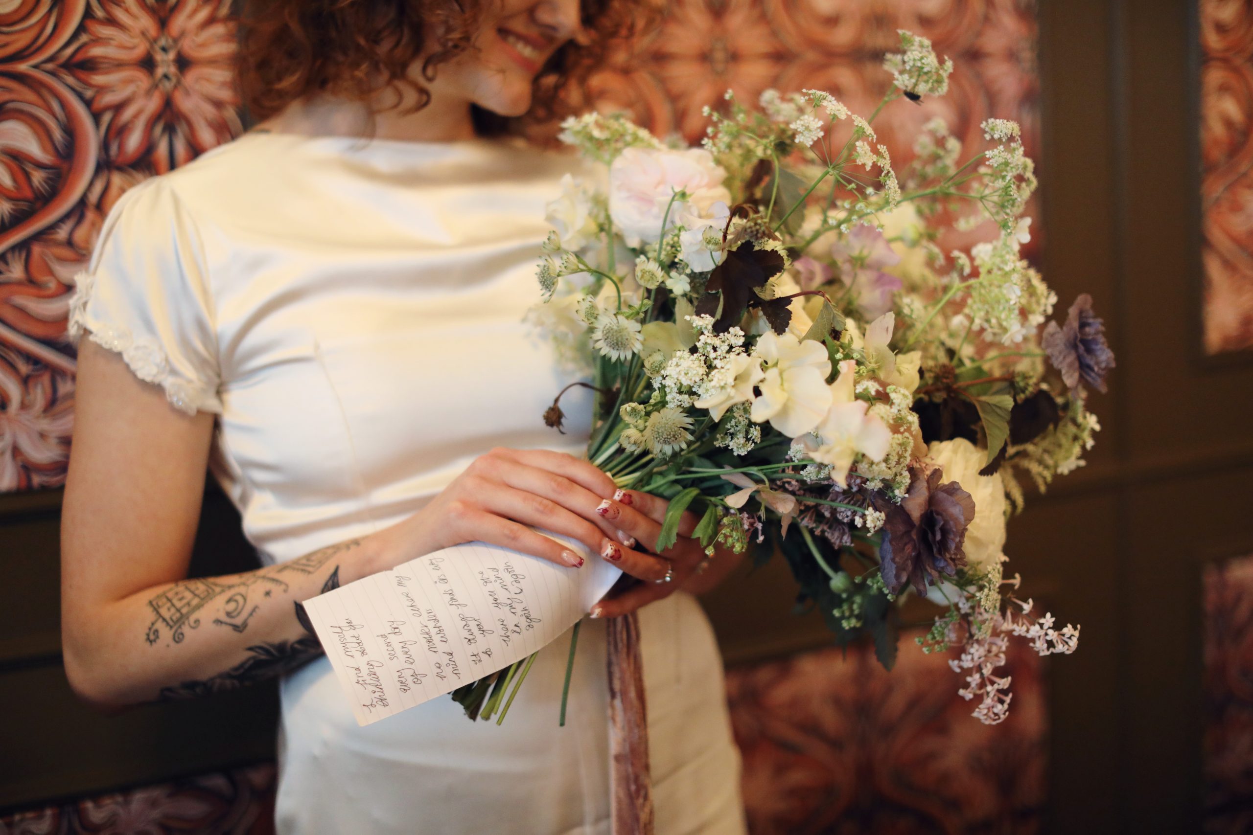 Vintage wedding inspiration featuring classic bridal fashion and florals.