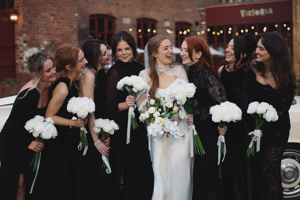 Ellie & Kamen ♡ The Victoria Wedding Venue, Sheffield 34 Bride with bridesmaids in black dresses