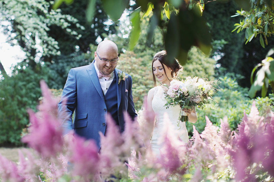 whirlow brook hall couple wedding pink flowers